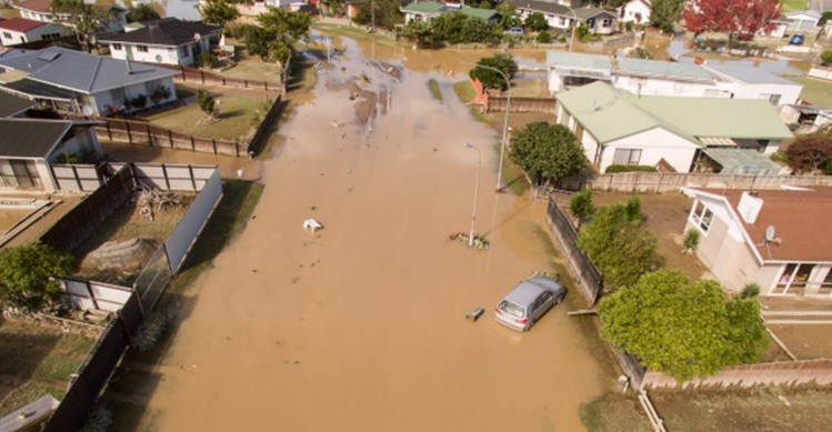 A street that has been flooded with water.