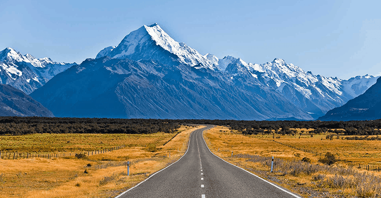 Road leading to mountains.